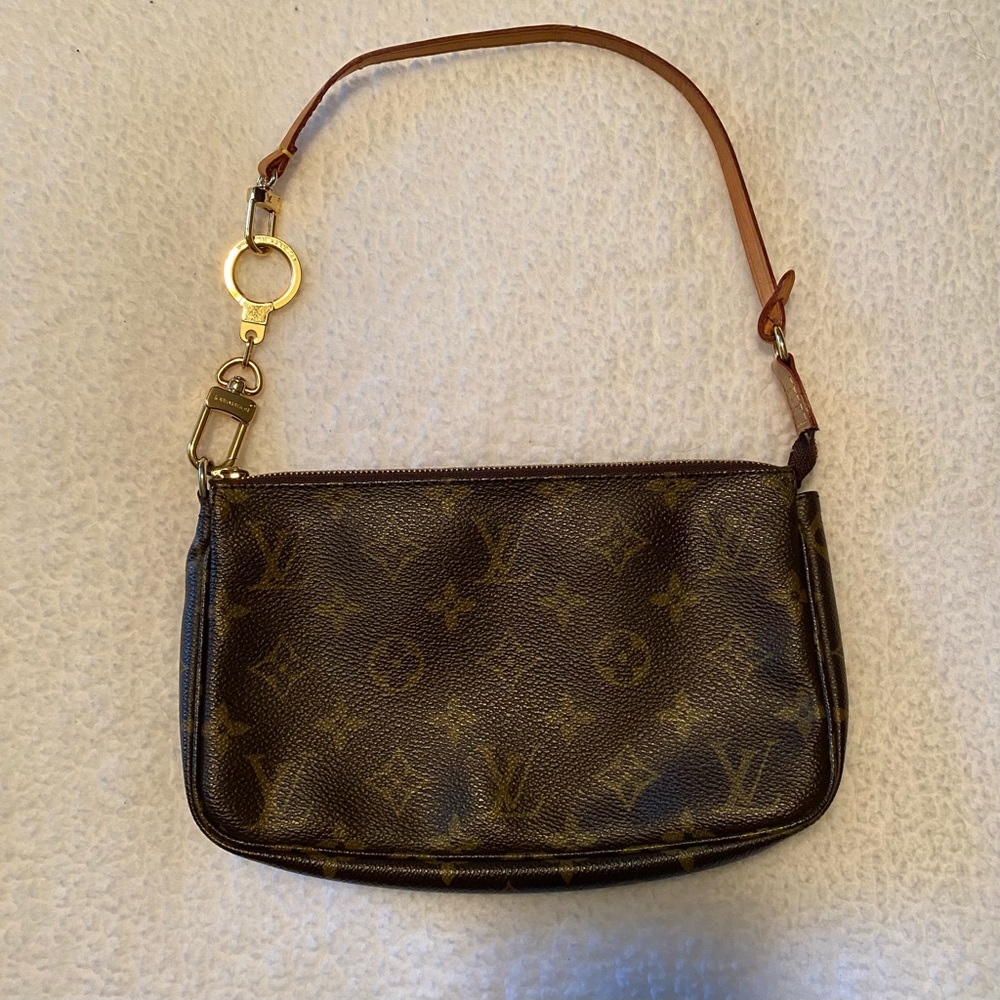 Vintage Louis Vuitton pouchette with extender.